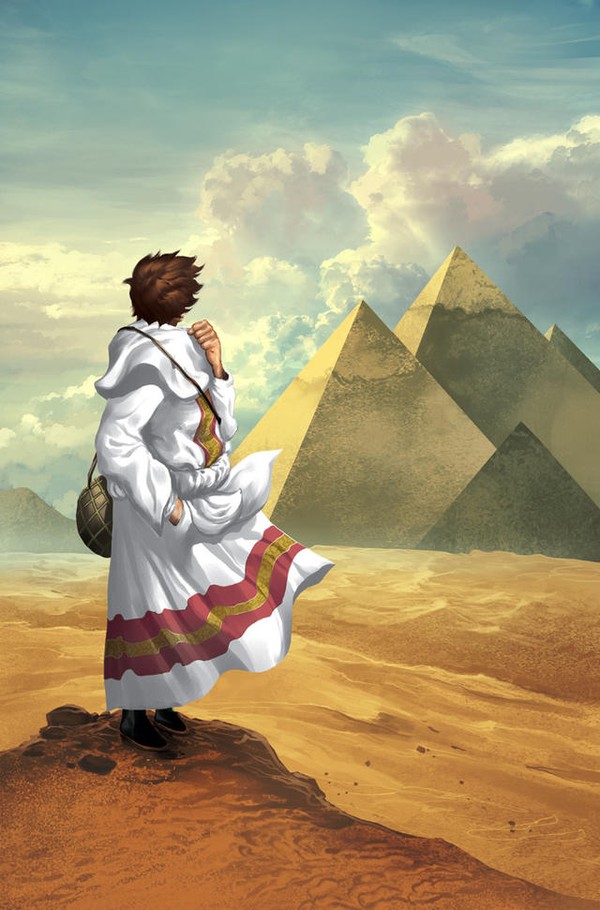 A picture of Santiago standing on a cliff in the desert that is overlooking the Pyramids of Egypt.